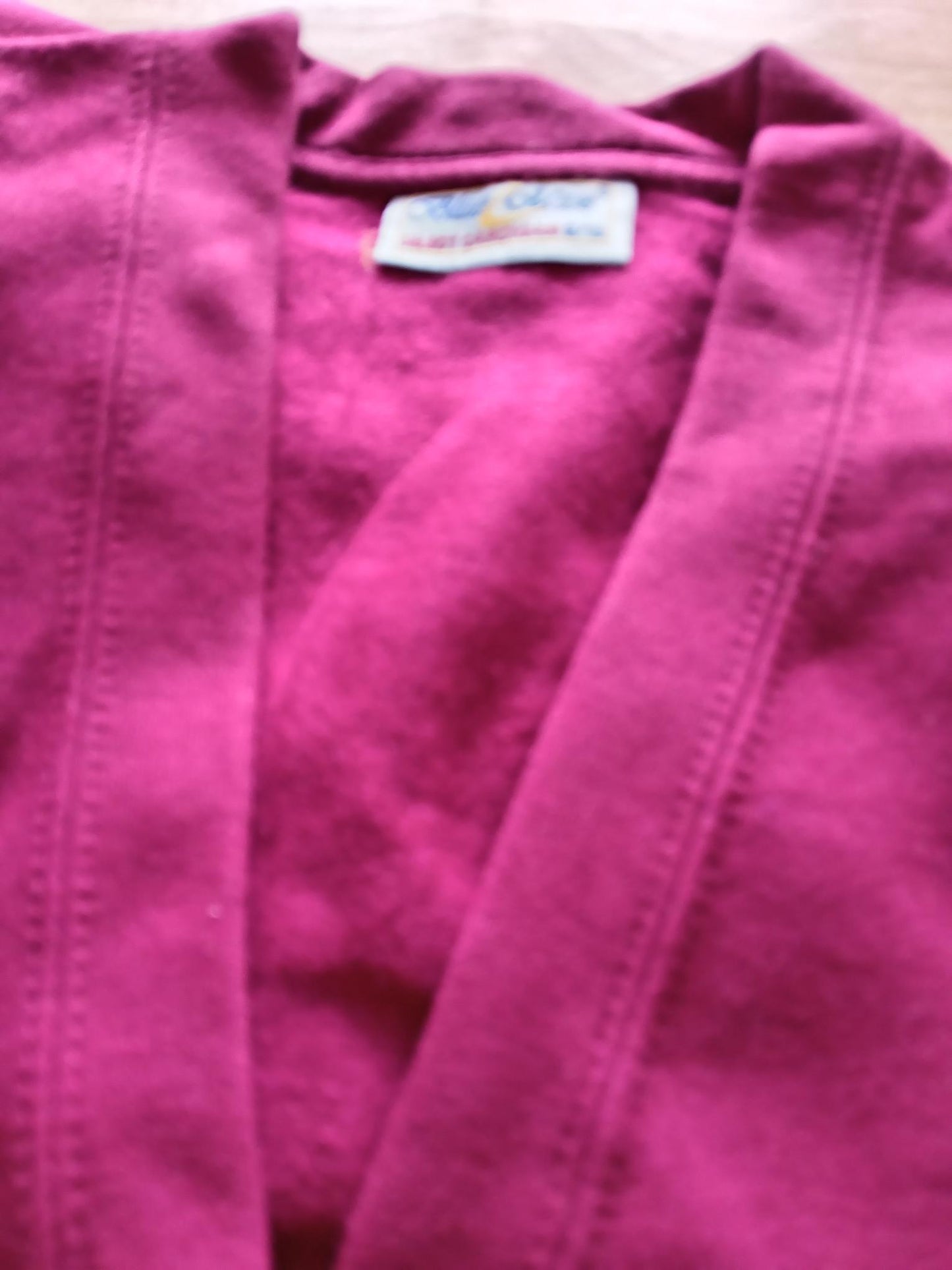 Burgandy cardigans and jumoers