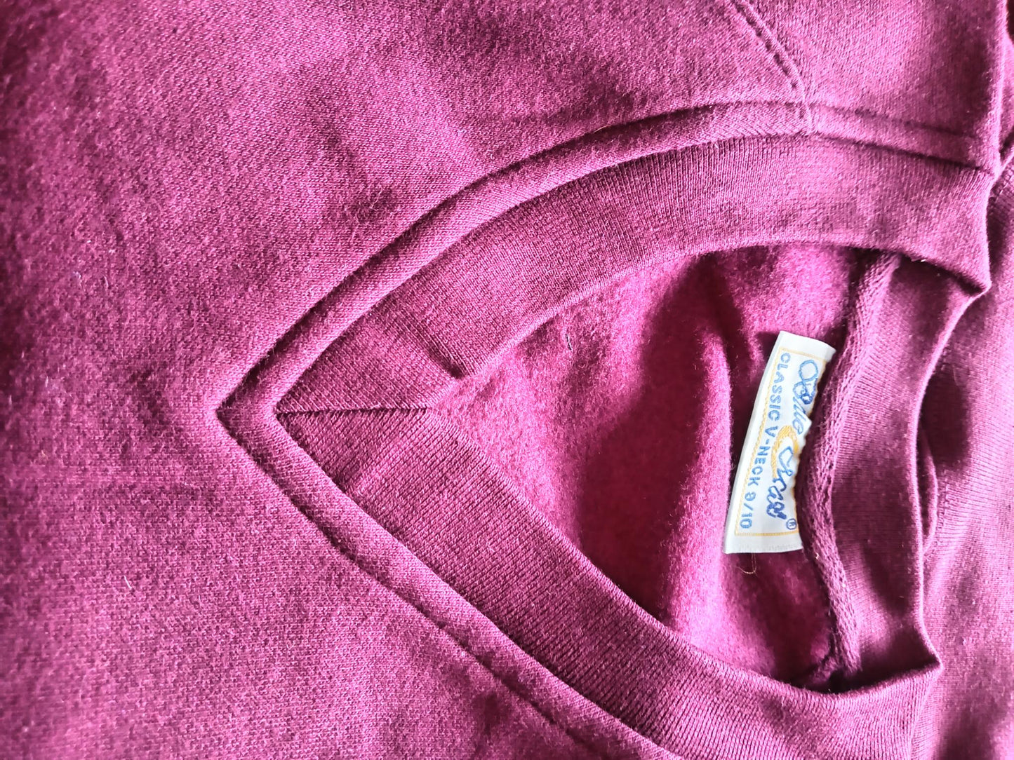 Burgandy cardigans and jumoers