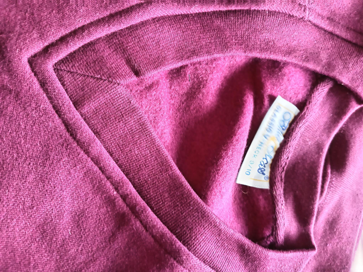 Burgandy cardigans and jumoers