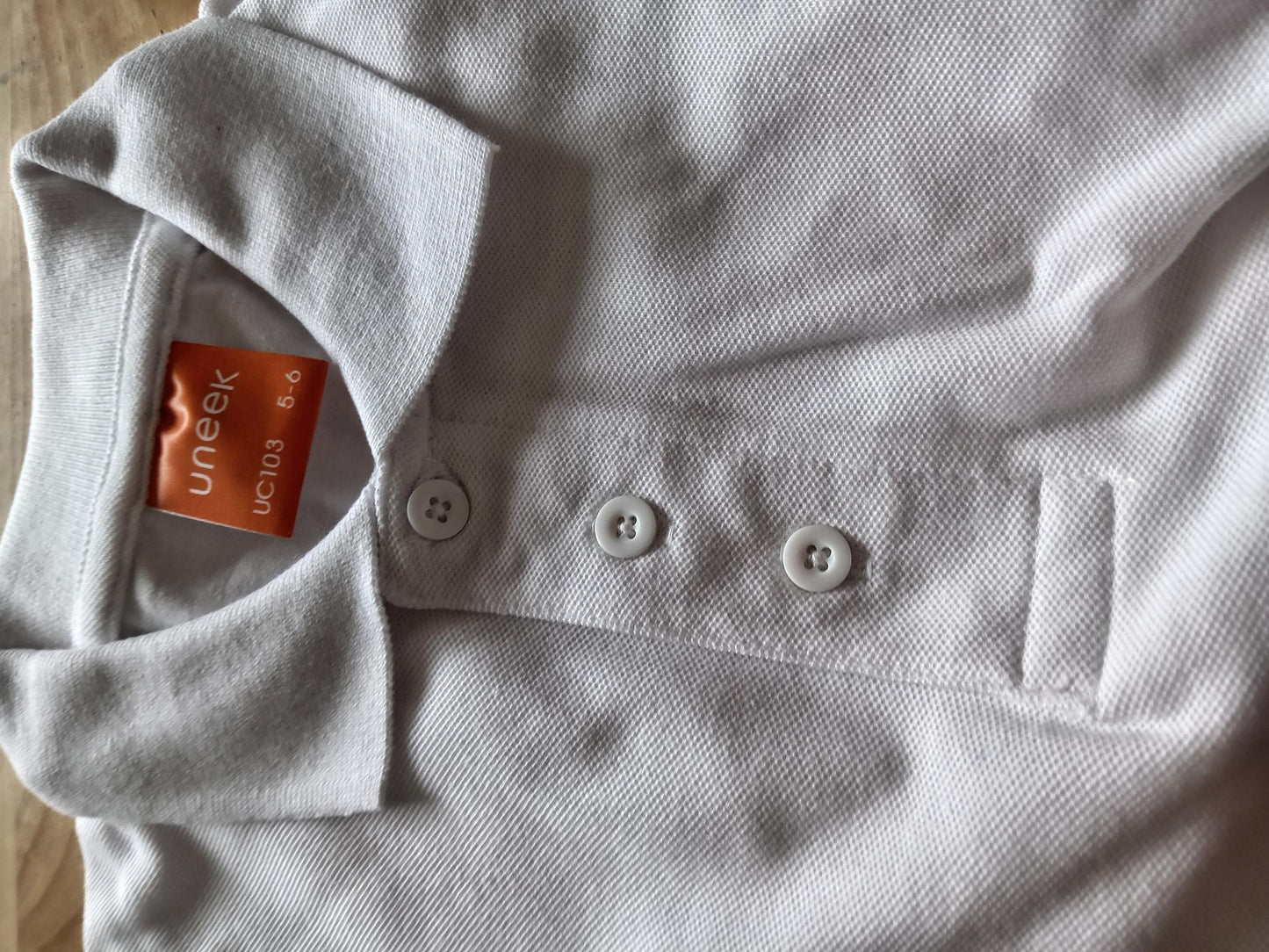 Pale blue polos