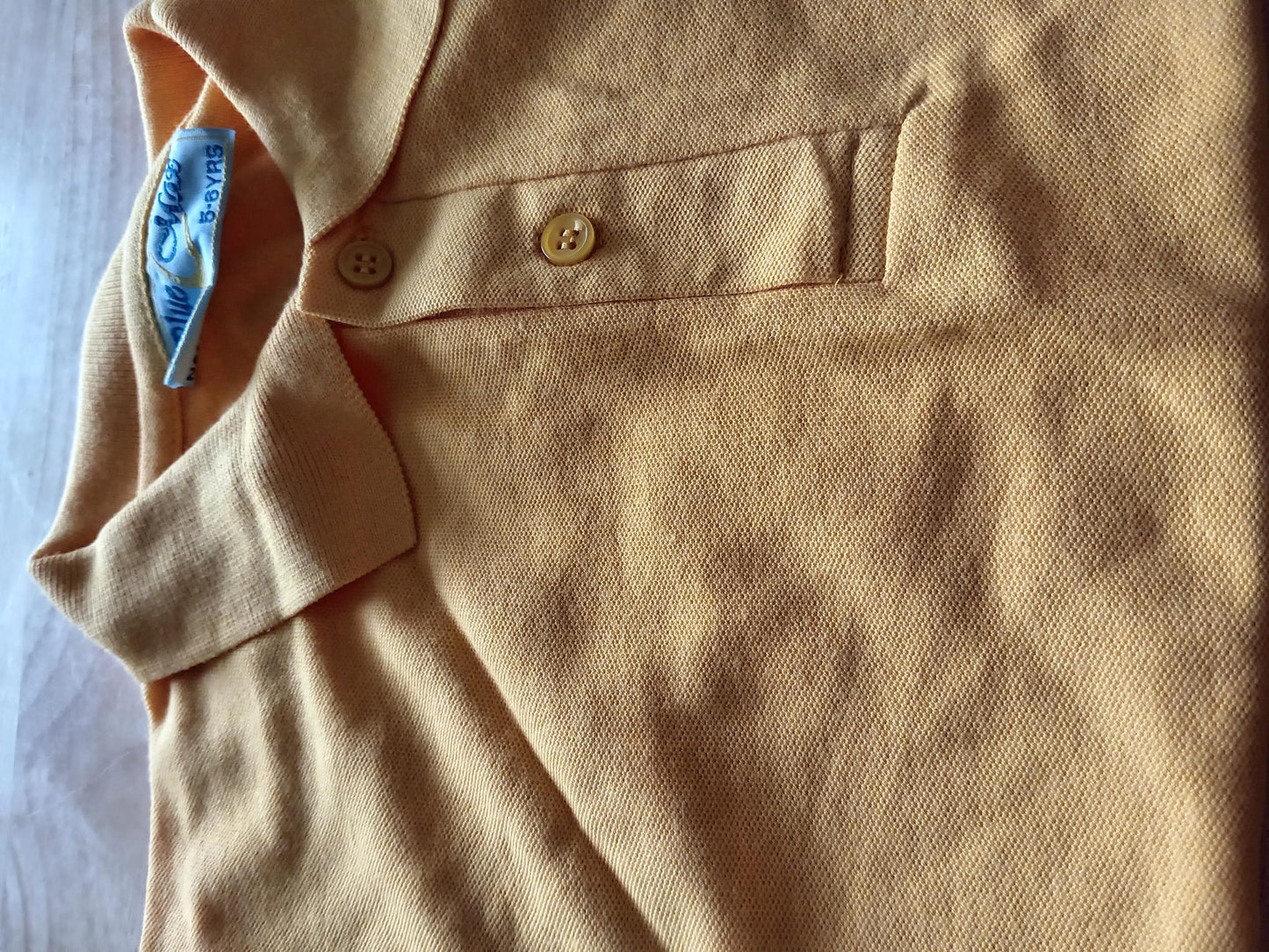 Yellow polo shirts
