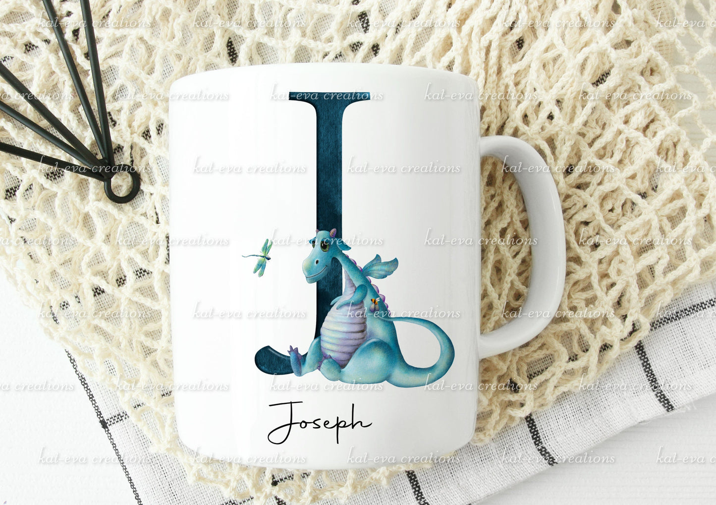 personalised initial dragon mug, available in pink or blue. ideal birthday or christmas gift