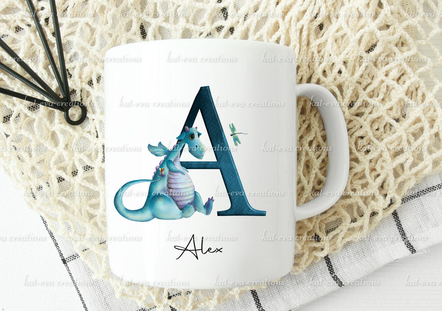personalised initial dragon mug, available in pink or blue. ideal birthday or christmas gift