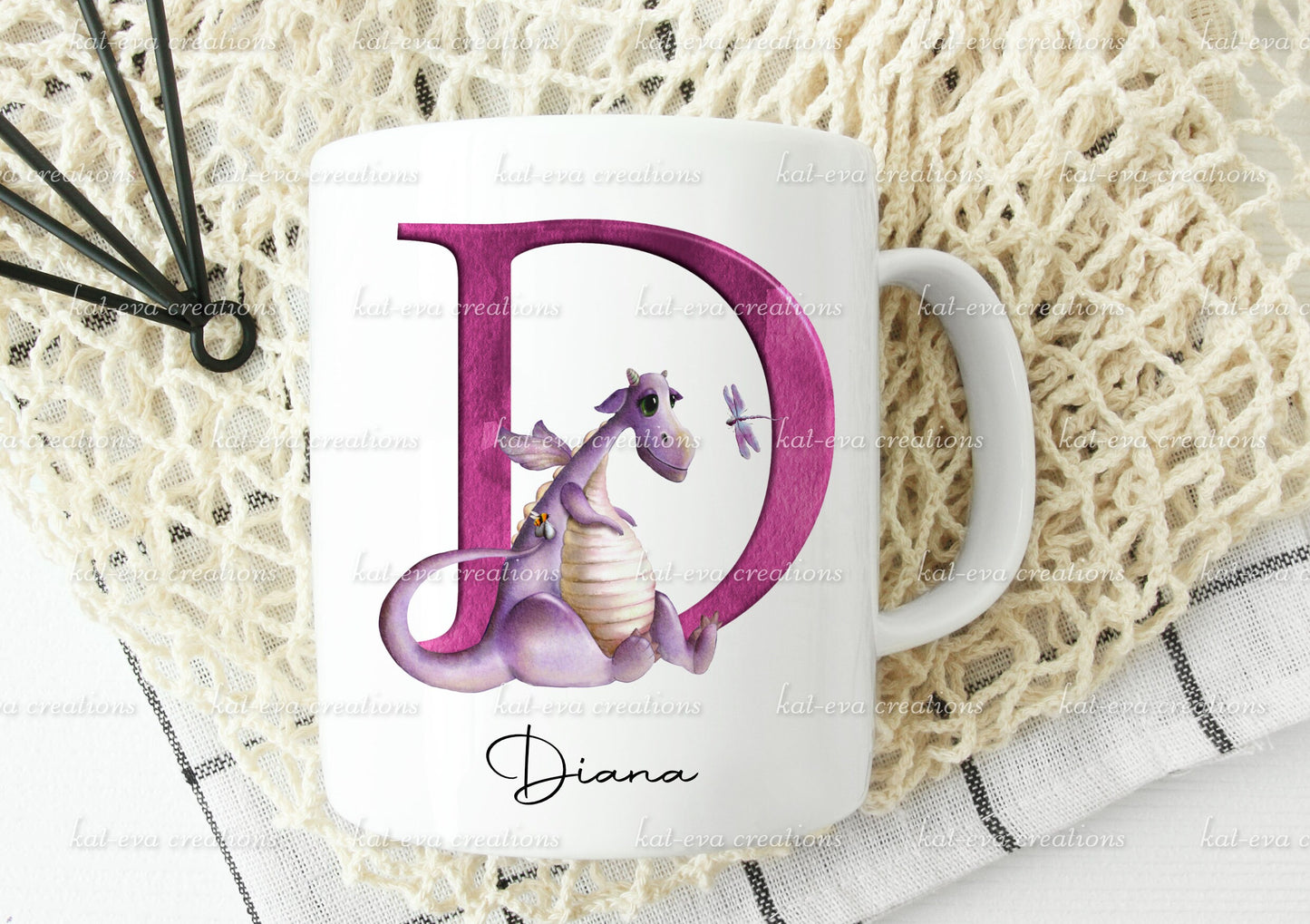 personalised initial dragon mug, available in pink or blue. ideal birthday or christmas gift