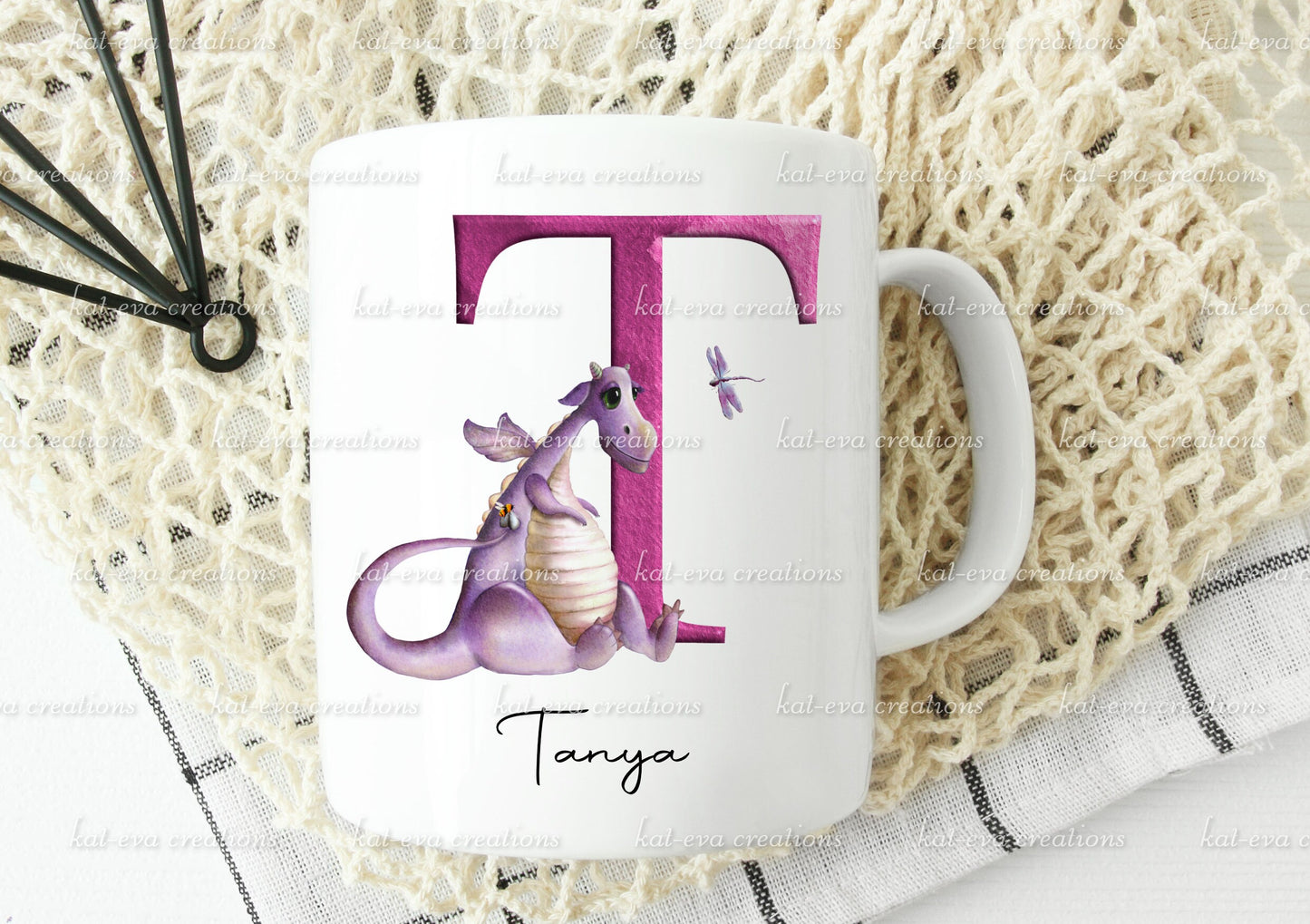 personalised initial dragon mug, available in pink or blue. ideal birthday or christmas gift