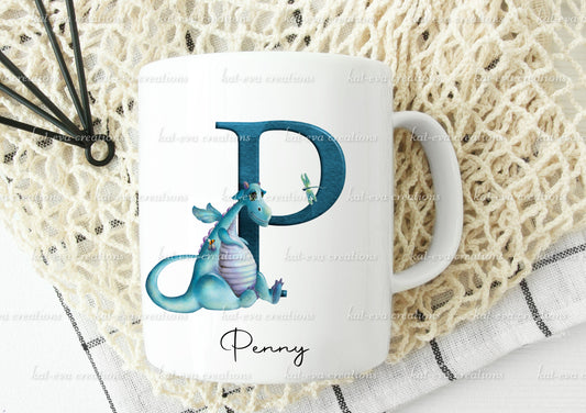 personalised initial dragon mug, available in pink or blue. ideal birthday or christmas gift